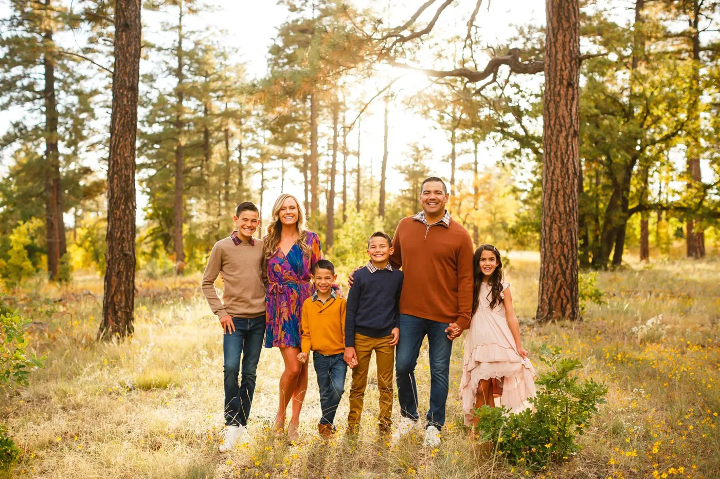 Gabe Trevizo with his wife Cindy and their four children outdoors in Arizona